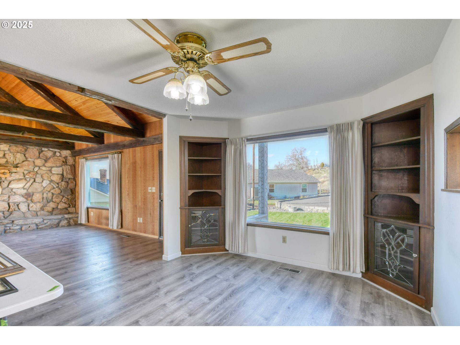 3540 Northeast King Place Pendleton, OR 97801 - Photo 21 of 48 wooden floor in an empty room with a window