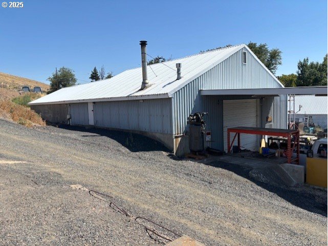 3540 Northeast King Place Pendleton, OR 97801 - Photo 8 of 48 a front view of a house with yard outdoor seating and mountain view
