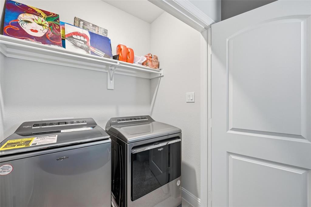 3544 Thistlewood Drive Plano, TX 75074 - Photo 16 of 24 a utility room with dryer and washer
