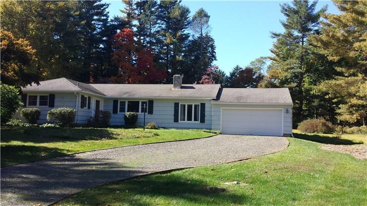 113 Bayberry Hill Road Ridgefield, CT 06877 - Photo 1 of 1 a front view of a house with a garden