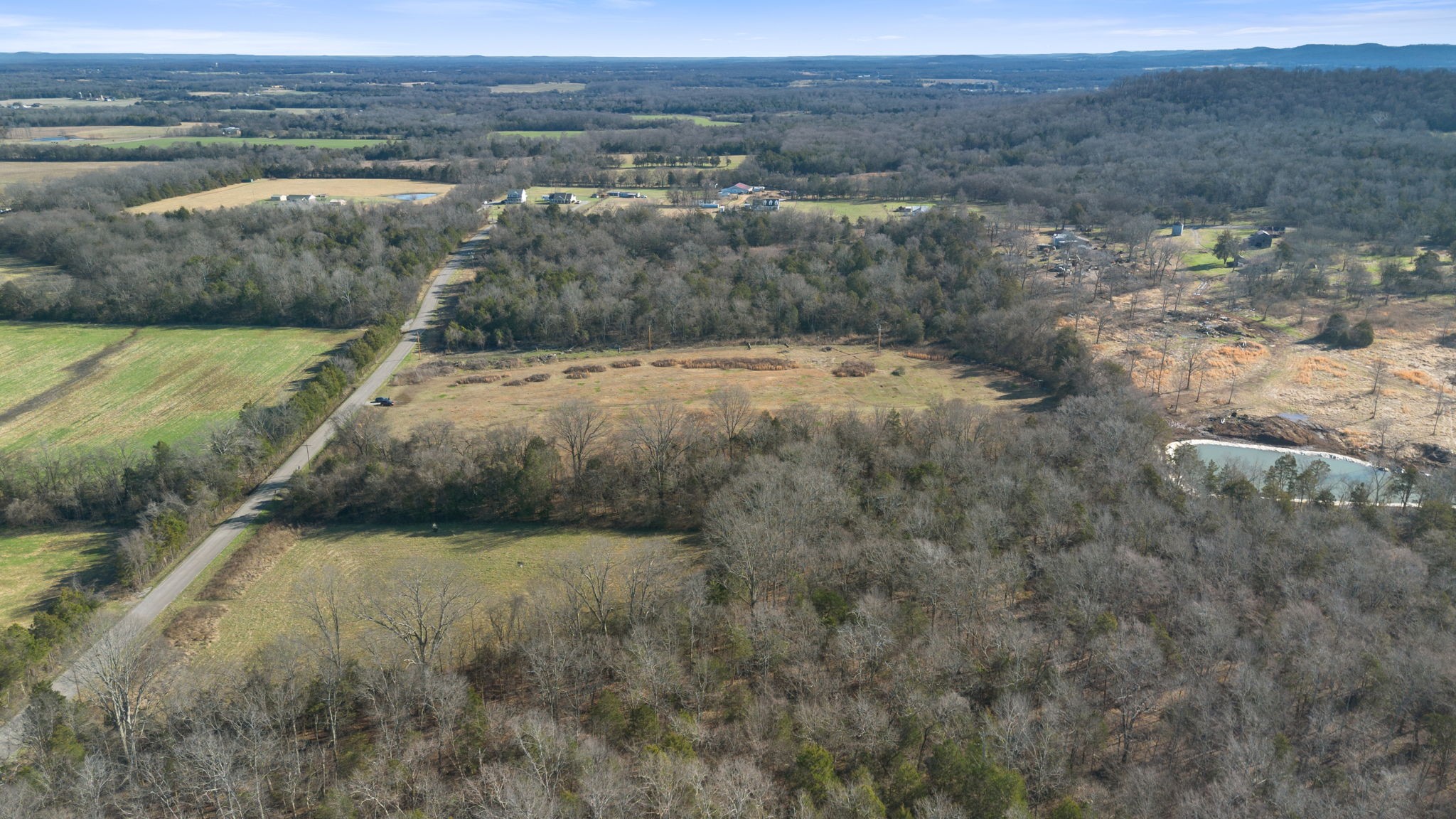 2265 Holly Grove Road Lewisburg, TN 37091 - Photo 23 of 47 a view of a lake with mountains in the background