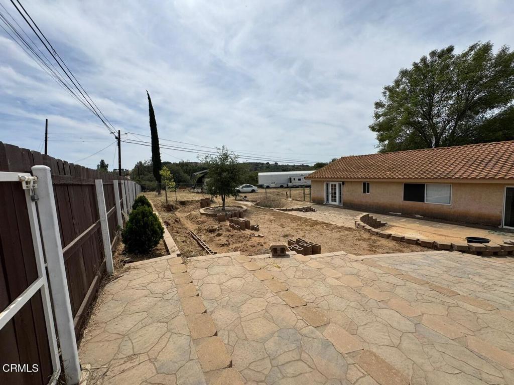 19163 Paradise Mountain Road Valley Center, CA 92082 - Photo 63 of 74 a view of a backyard of the house