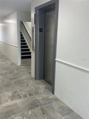 a view of entryway with stairs