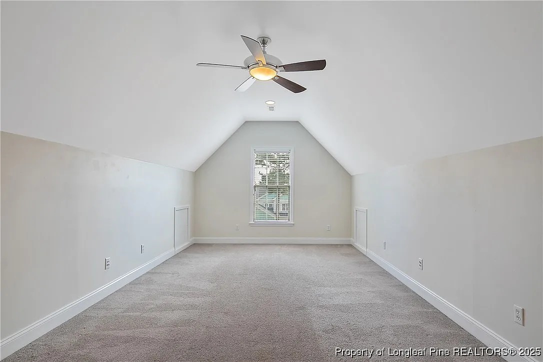 177 Lamplighter Way Spring Lake, NC 28390 - Photo 15 of 21 an empty room with a ceiling fan and window