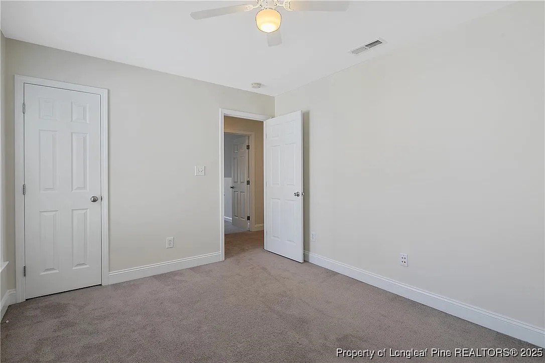 177 Lamplighter Way Spring Lake, NC 28390 - Photo 18 of 21 a view of an empty room and window