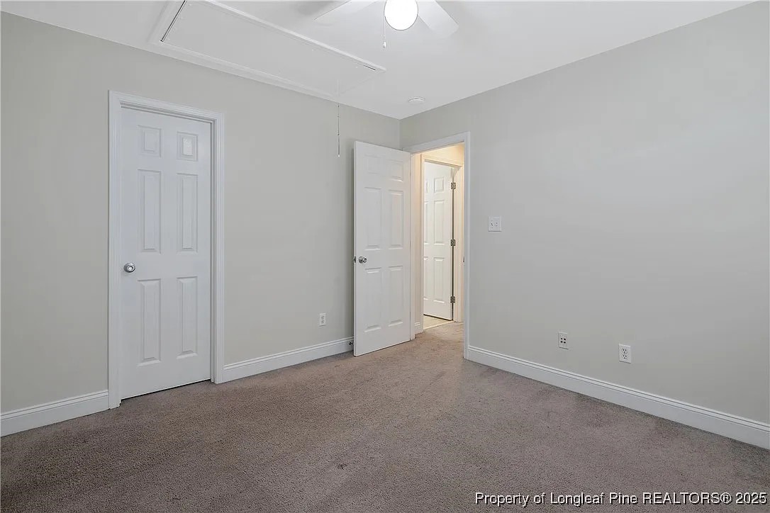 177 Lamplighter Way Spring Lake, NC 28390 - Photo 19 of 21 a view of an empty room and a ceiling fan