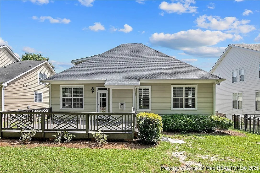 177 Lamplighter Way Spring Lake, NC 28390 - Photo 21 of 21 a front view of a house with a garden