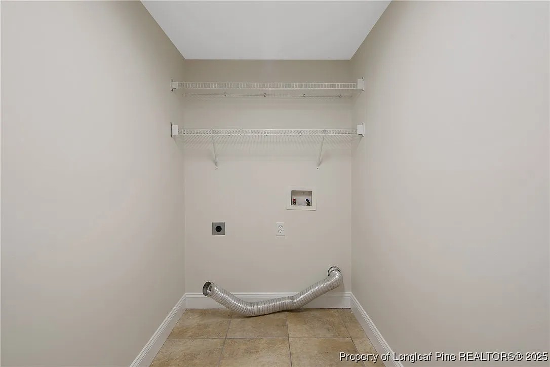 177 Lamplighter Way Spring Lake, NC 28390 - Photo 8 of 21 a bathroom with a white toilet
