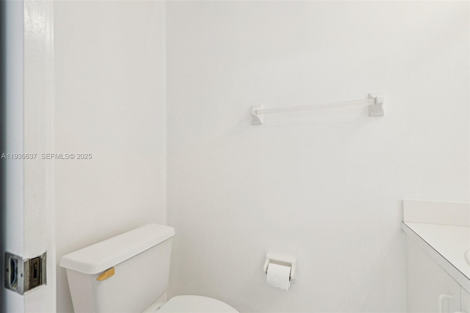 17811 Southwest 4th Court Pembroke Pines, FL 33029 - Photo 15 of 74 a white toilet sitting next to a shower