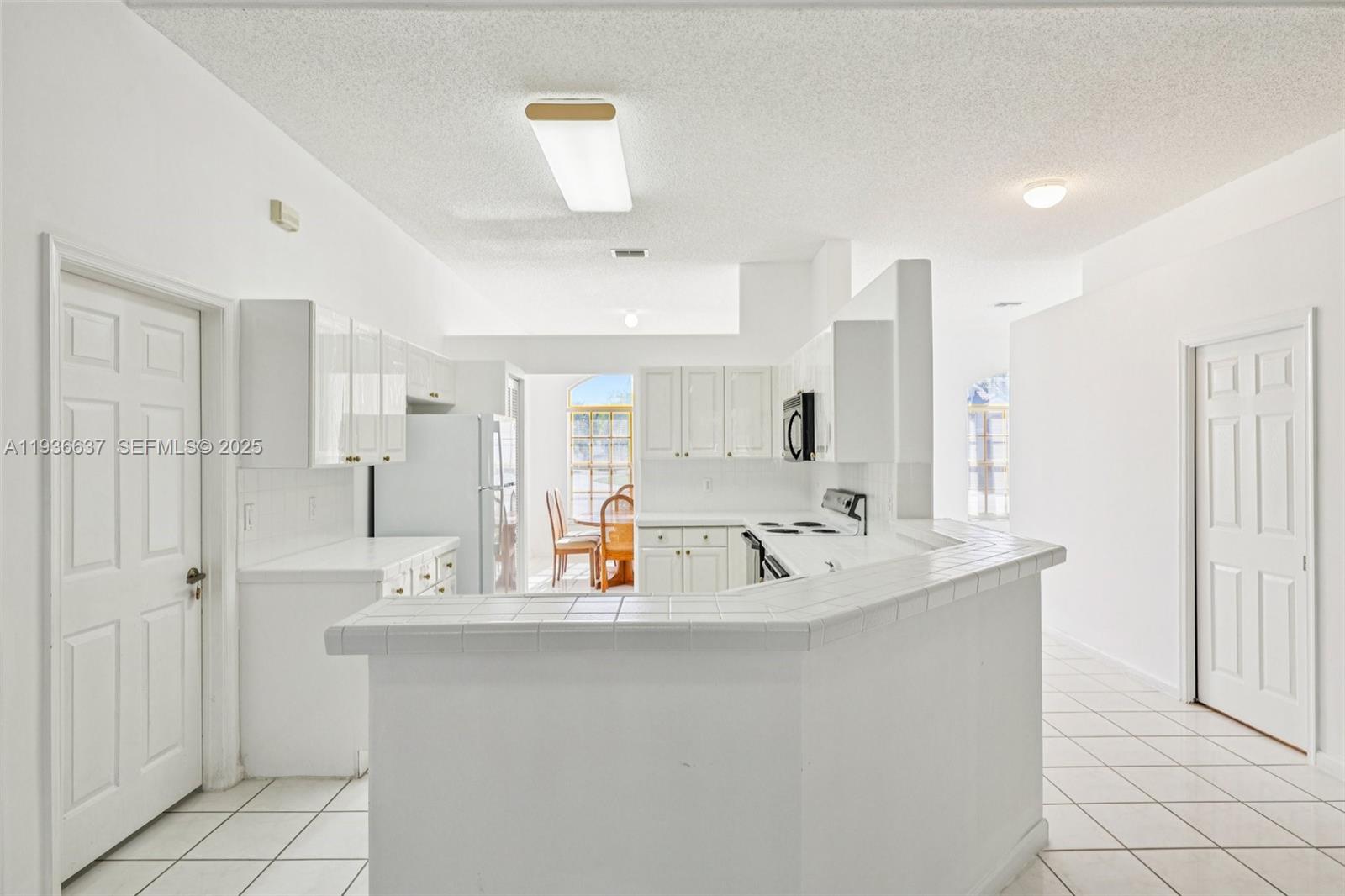 17811 Southwest 4th Court Pembroke Pines, FL 33029 - Photo 19 of 74 a view of bathroom with dual sinks