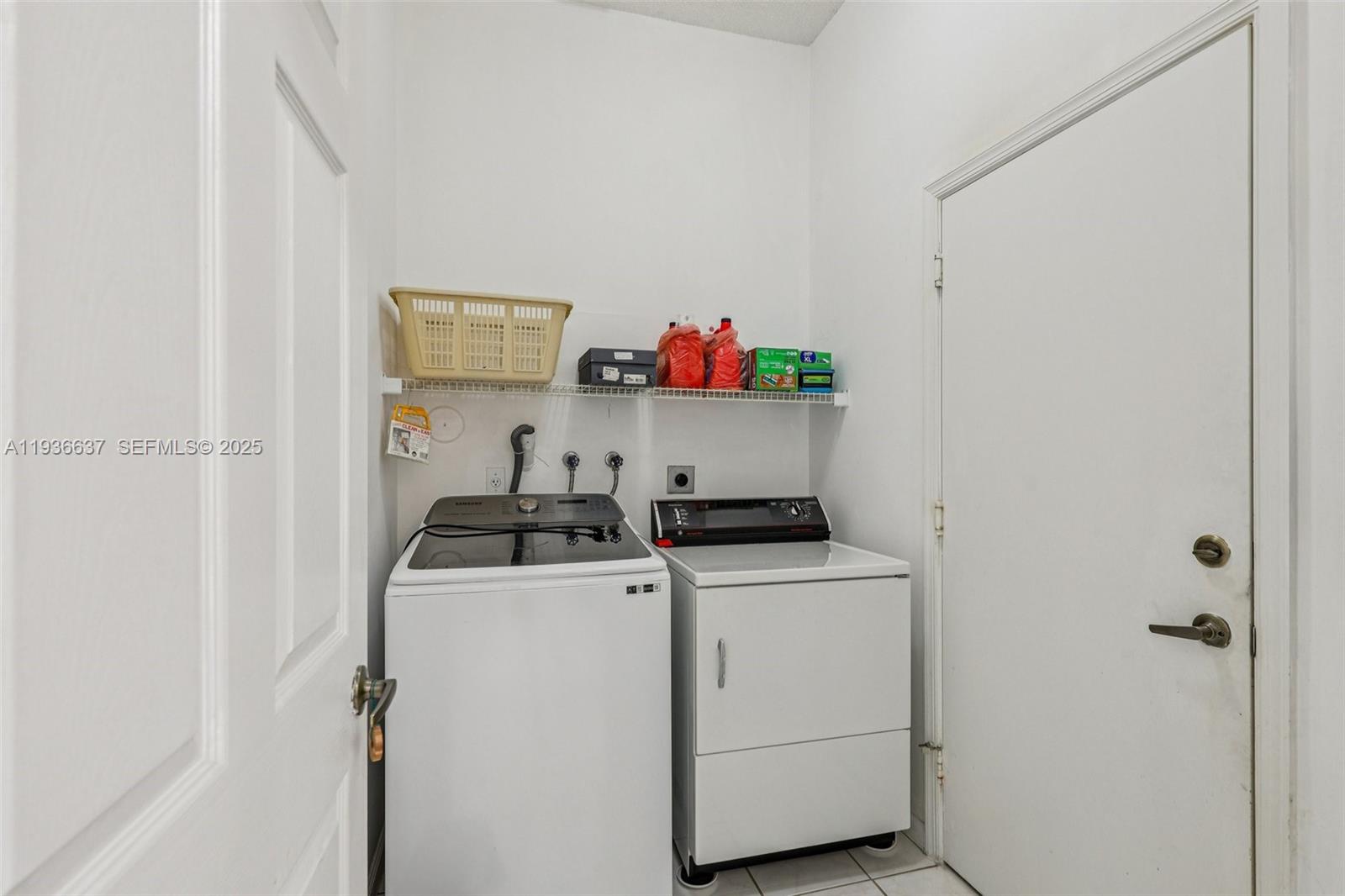 17811 Southwest 4th Court Pembroke Pines, FL 33029 - Photo 24 of 74 a utility room with dryer and washer