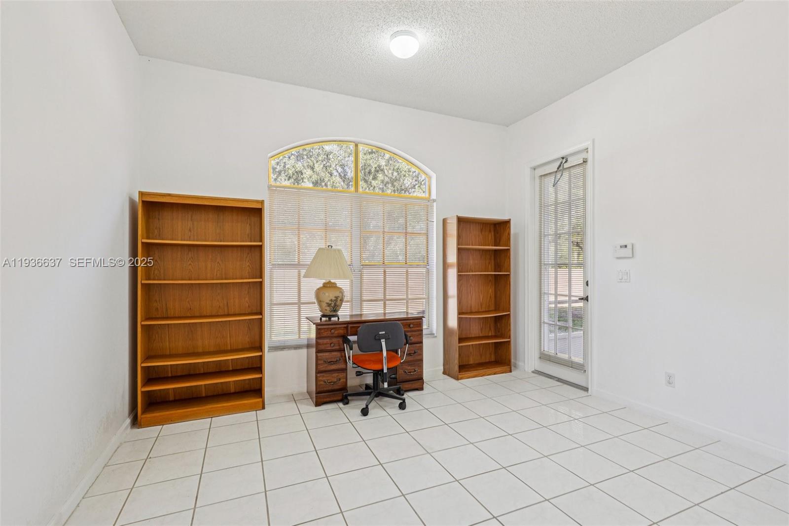 17811 Southwest 4th Court Pembroke Pines, FL 33029 - Photo 32 of 74 a view of walk in closet with empty racks