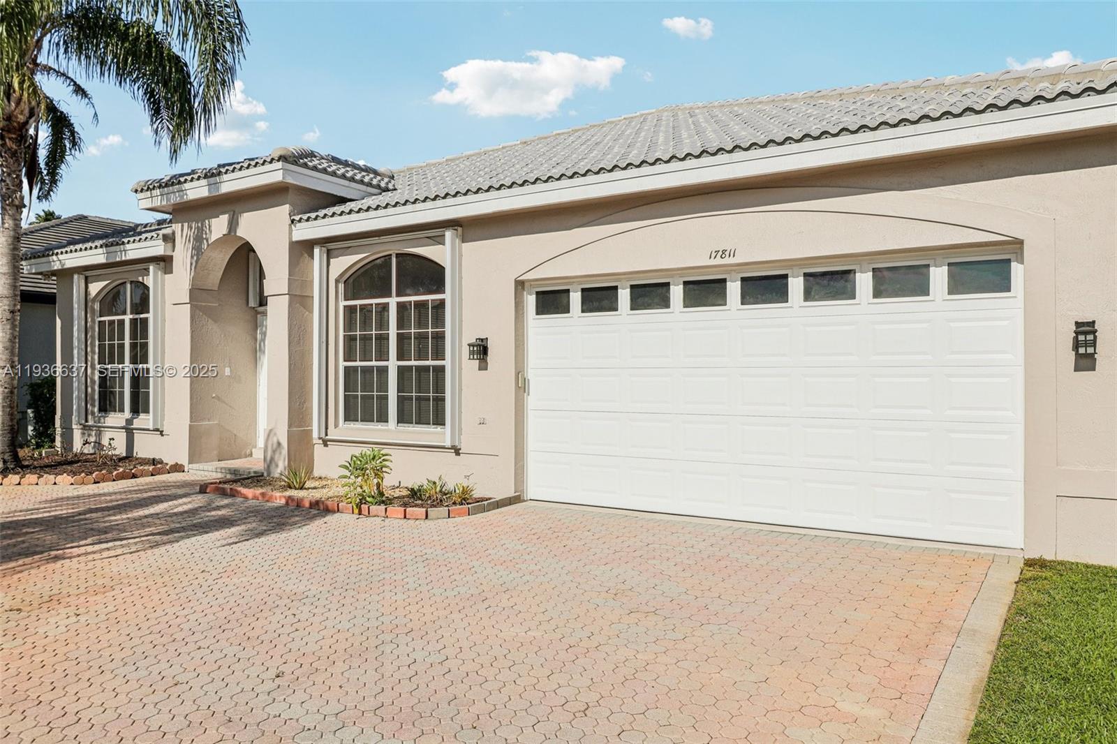 17811 Southwest 4th Court Pembroke Pines, FL 33029 - Photo 4 of 74 a view of a house with a outdoor space