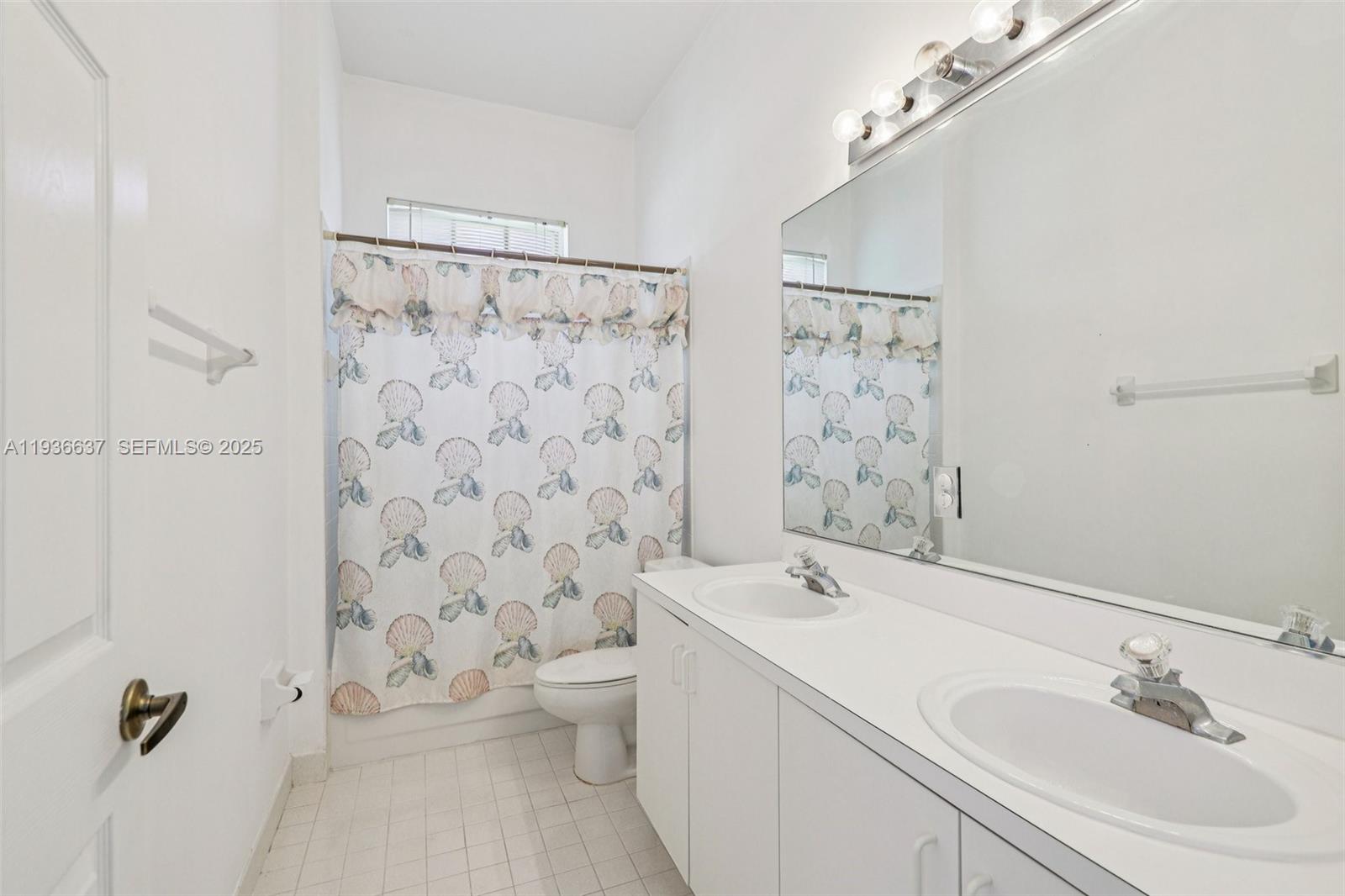 17811 Southwest 4th Court Pembroke Pines, FL 33029 - Photo 46 of 74 a bathroom with a sink toilet and shower