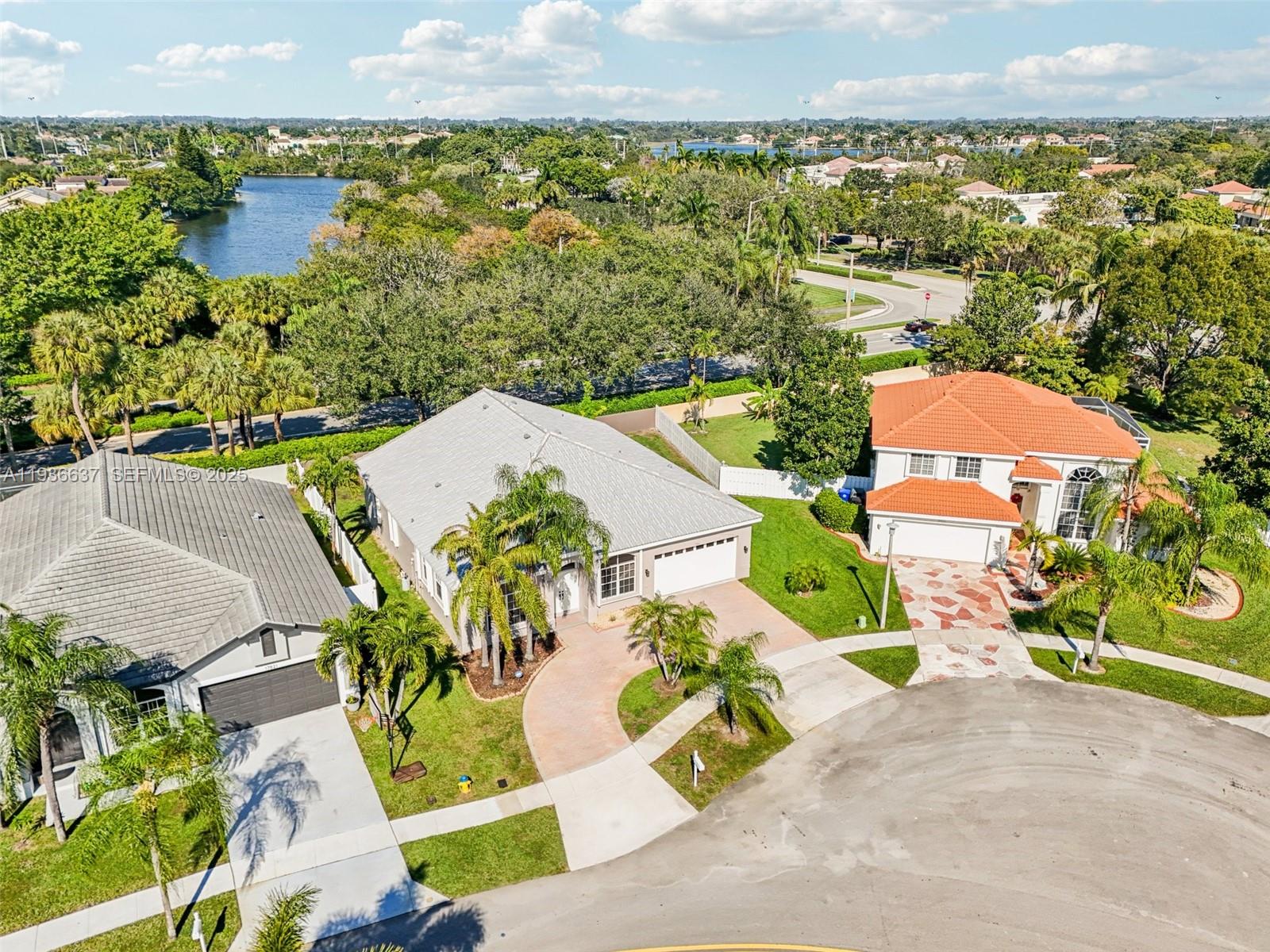 17811 Southwest 4th Court Pembroke Pines, FL 33029 - Photo 58 of 74 an aerial view of a house with a lake view