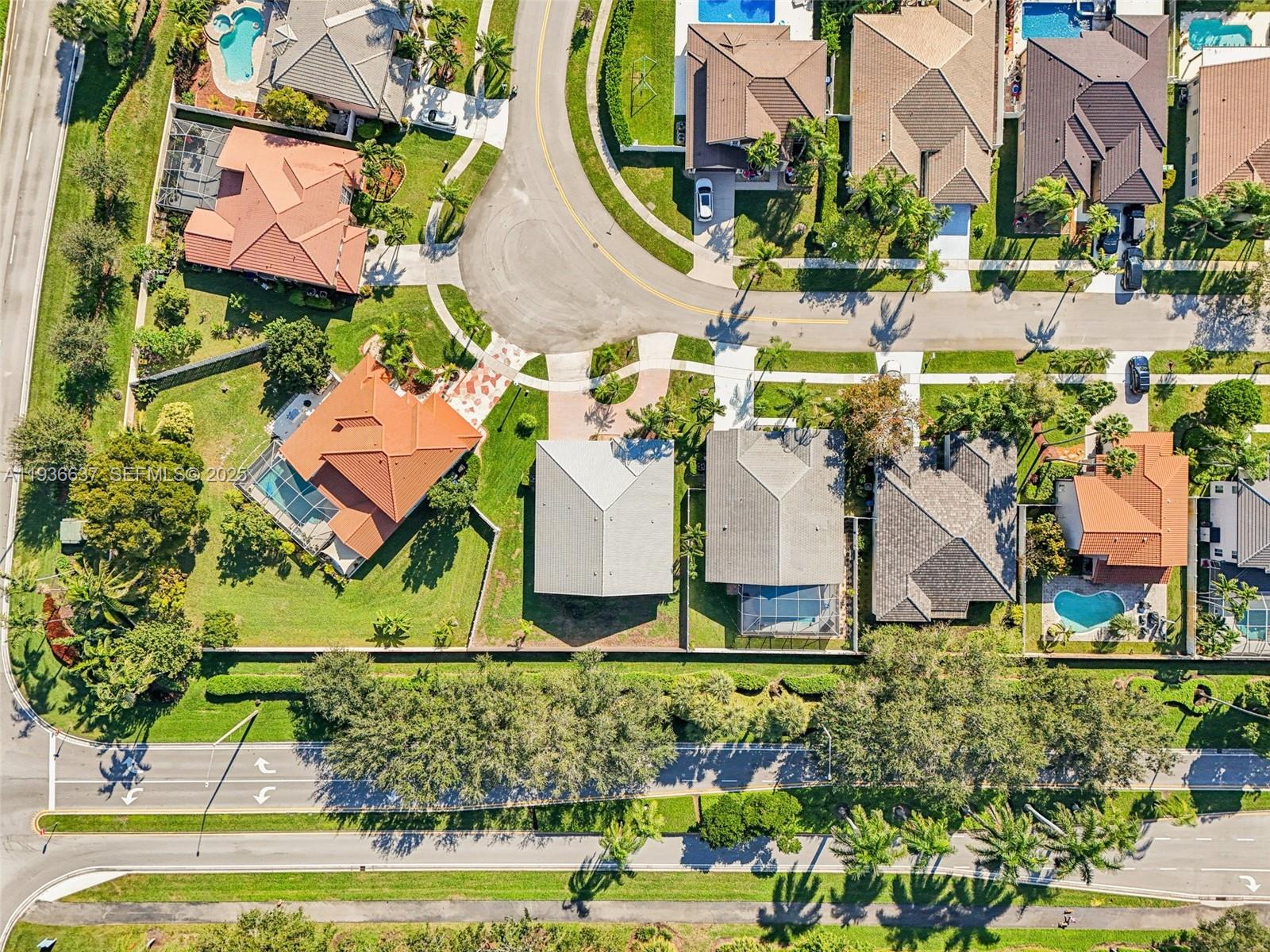 17811 Southwest 4th Court Pembroke Pines, FL 33029 - Photo 67 of 74 an aerial view of multiple houses with yard