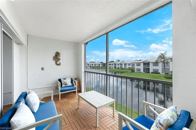 a view of a living room and a wooden floor