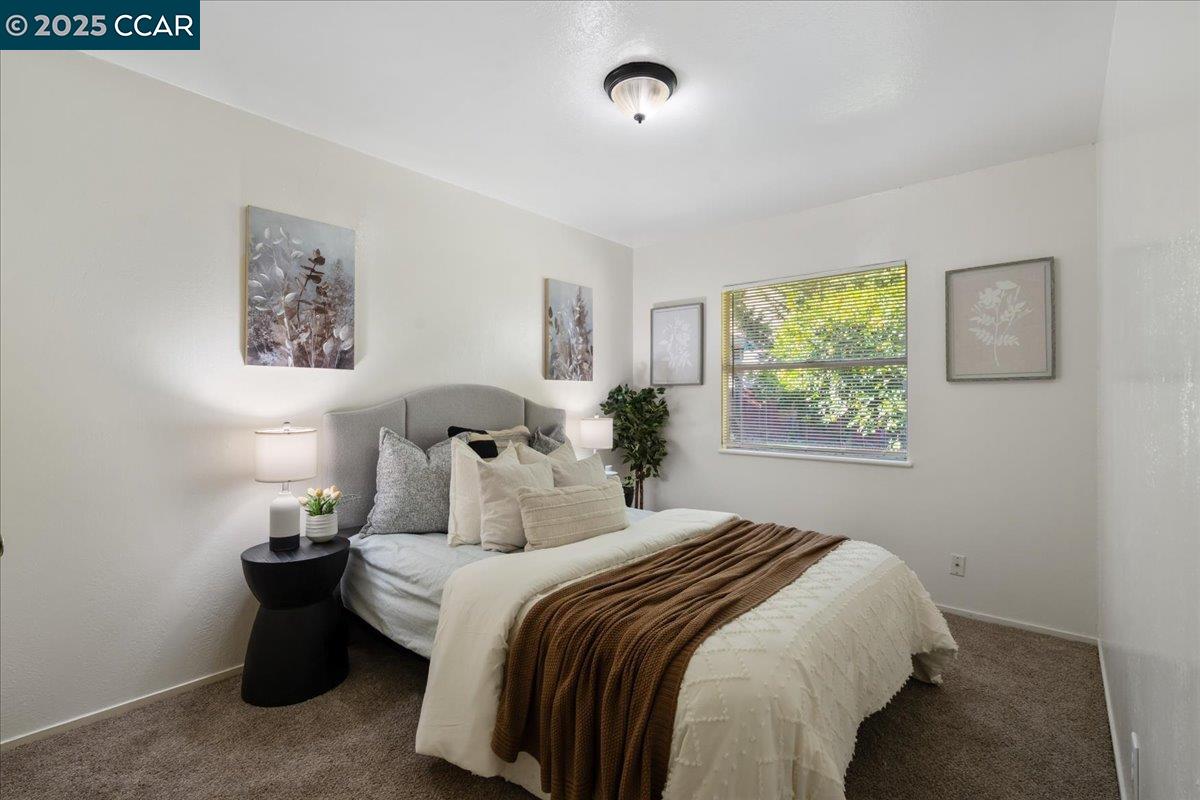 725 Del Norte Street Vallejo, CA 94591 - Photo 18 of 25 a bedroom with bed and window