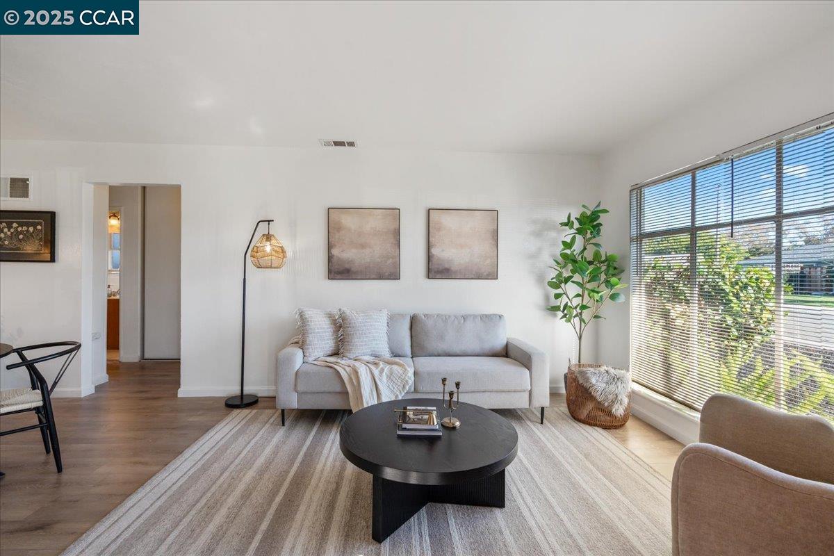 725 Del Norte Street Vallejo, CA 94591 - Photo 3 of 25 a living room with furniture and a large window