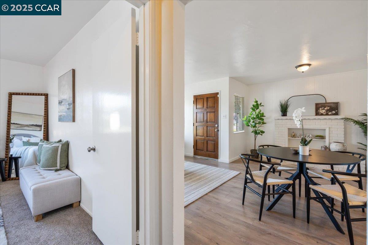725 Del Norte Street Vallejo, CA 94591 - Photo 6 of 25 a view of a dining room with furniture and wooden floor