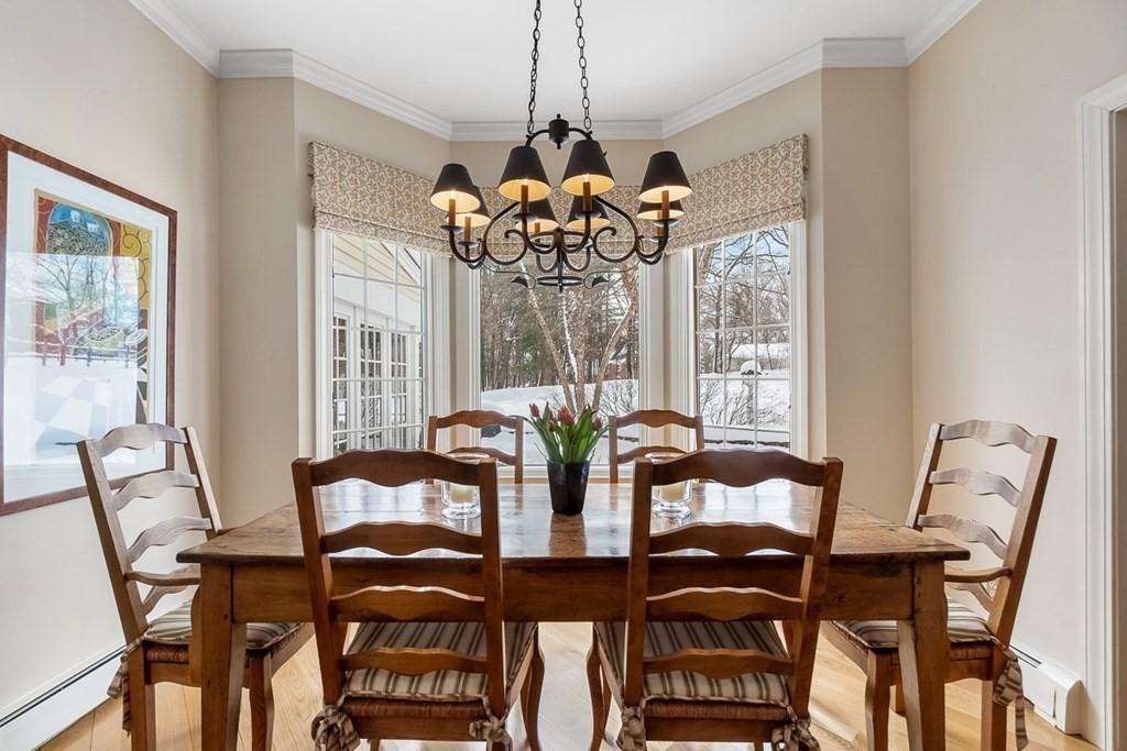 853 Strawberry Hill Road Concord, MA 01742 - Photo 14 of 41 a view of a dining room with furniture window and outside view