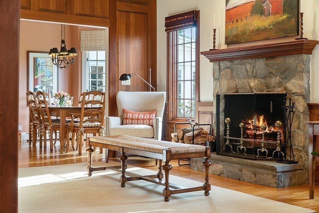 853 Strawberry Hill Road Concord, MA 01742 - Photo 15 of 41 a living room with furniture and a fireplace