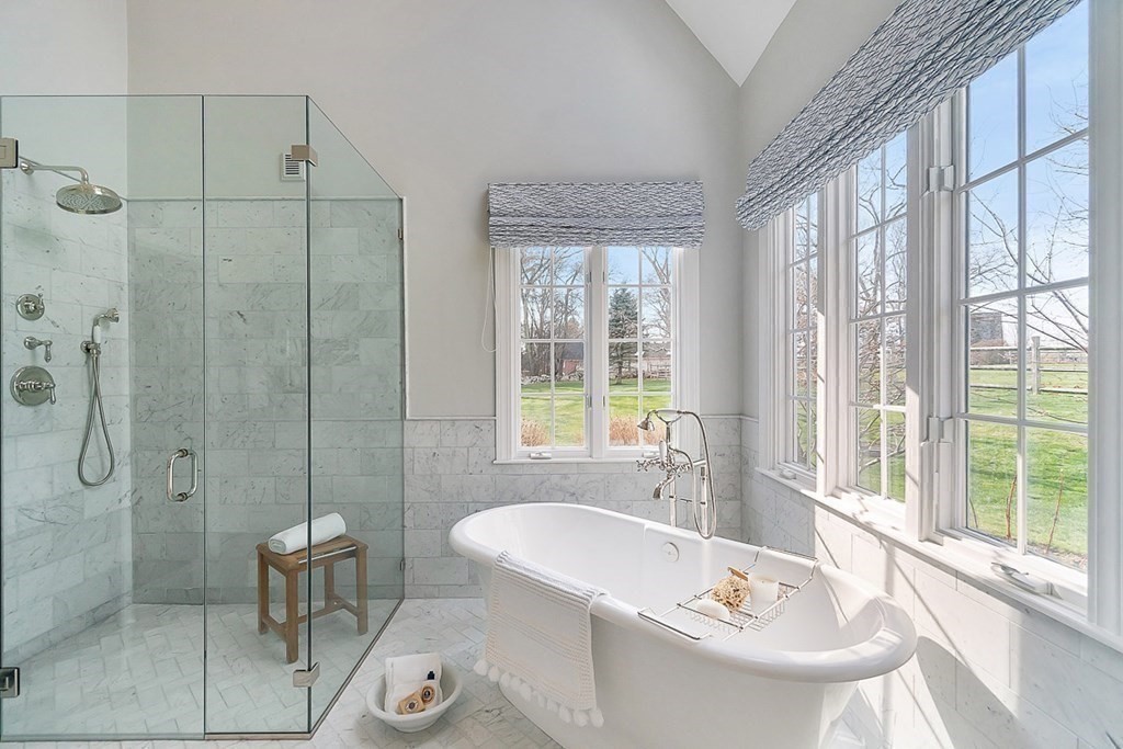 853 Strawberry Hill Road Concord, MA 01742 - Photo 23 of 41 a bathroom with a sink and a tub