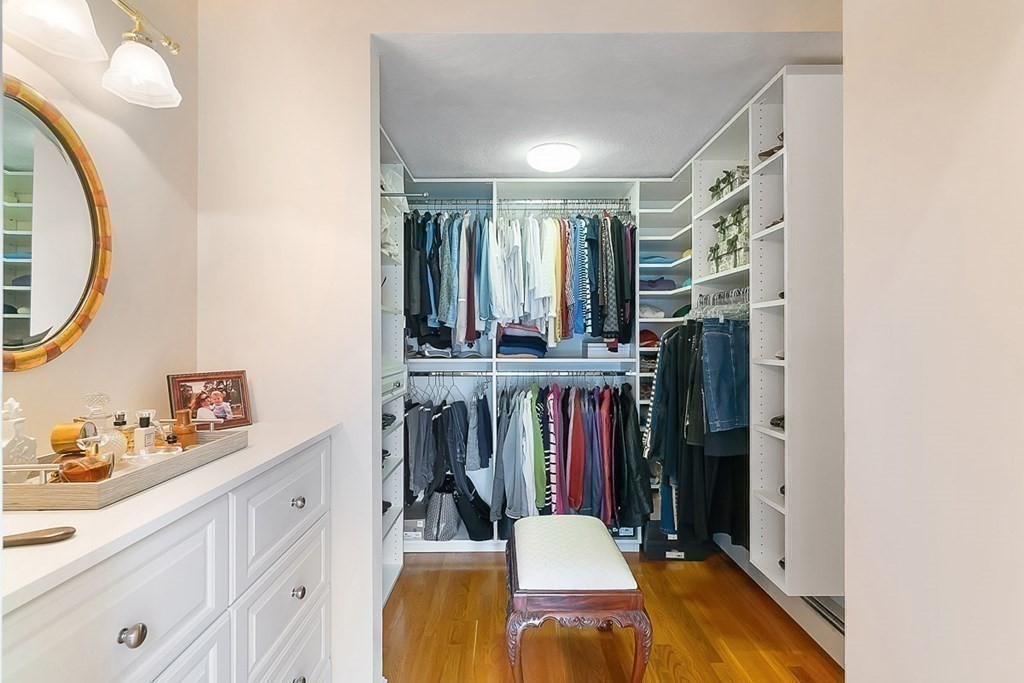 853 Strawberry Hill Road Concord, MA 01742 - Photo 25 of 41 a view of a kitchen area with furniture and staircase