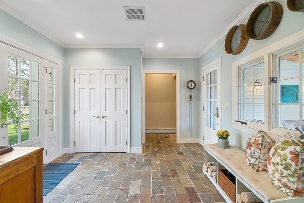 853 Strawberry Hill Road Concord, MA 01742 - Photo 31 of 41 a spacious bathroom with a granite countertop double vanity sink a mirror and a shower