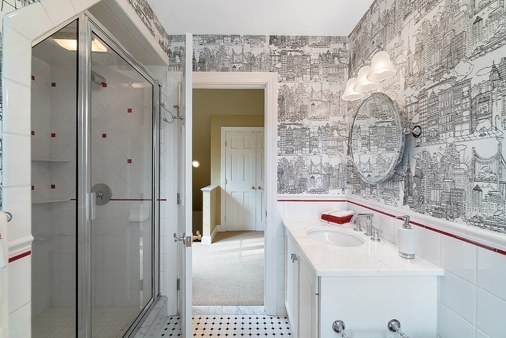 853 Strawberry Hill Road Concord, MA 01742 - Photo 33 of 41 a bathroom with a sink and a mirror