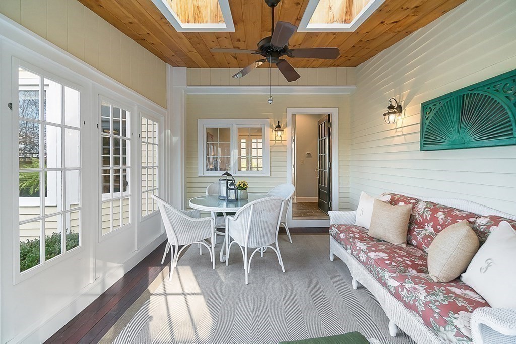 853 Strawberry Hill Road Concord, MA 01742 - Photo 34 of 41 a view of a dining room with furniture window and wooden floor