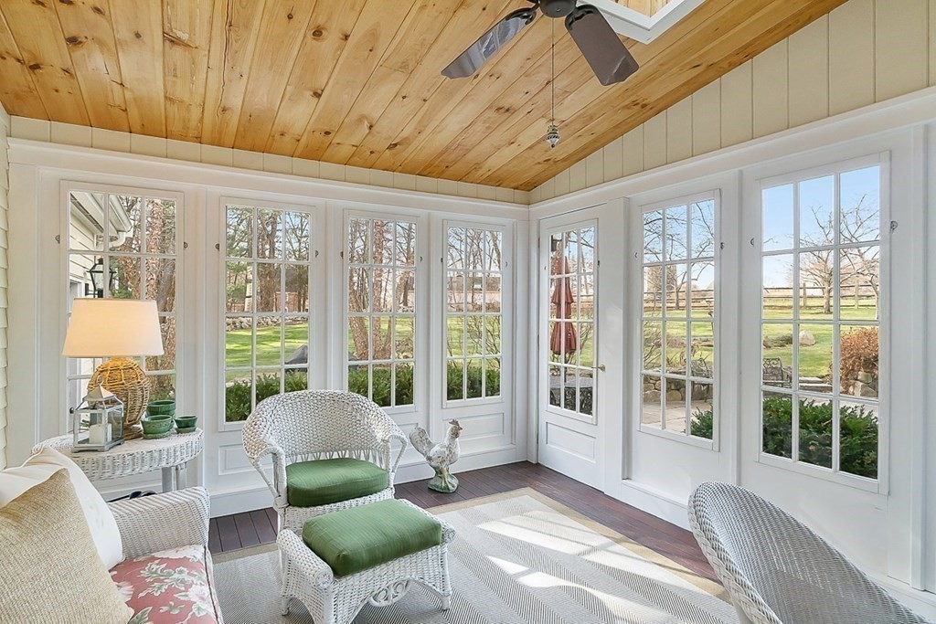 853 Strawberry Hill Road Concord, MA 01742 - Photo 35 of 41 a living room with furniture and a large window
