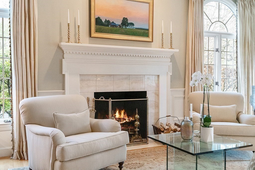853 Strawberry Hill Road Concord, MA 01742 - Photo 7 of 41 a living room with furniture and a fireplace