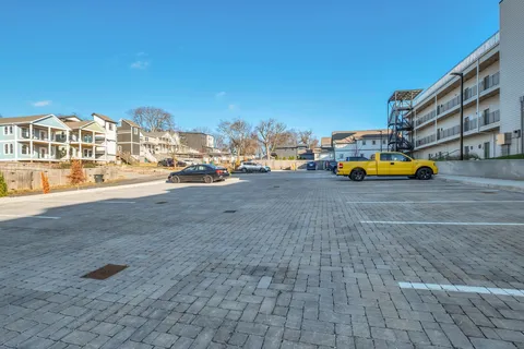 a view of yard with car parked