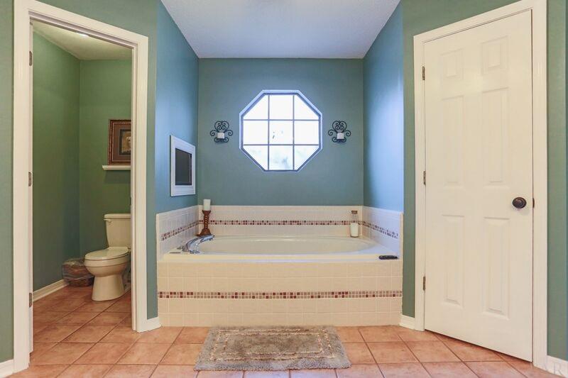 6658 Martin Road Milton, FL 32570 - Photo 39 of 45 Double vanity, garden tub & separate tiled shower