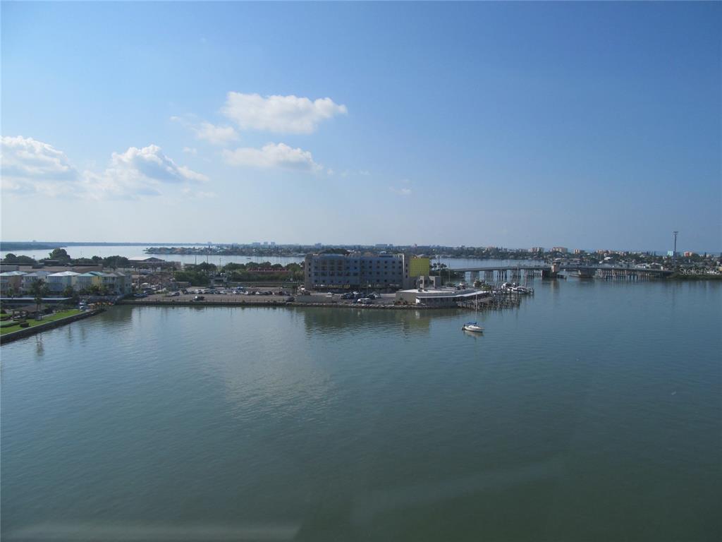 4775 Cove Circle, Unit 1202 Madeira Beach, FL 33708 - Photo 2 of 32 a view of a lake view