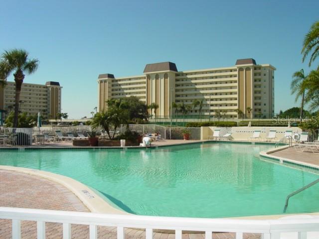4775 Cove Circle, Unit 1202 Madeira Beach, FL 33708 - Photo 26 of 32 a aerial view of a city with tall buildings