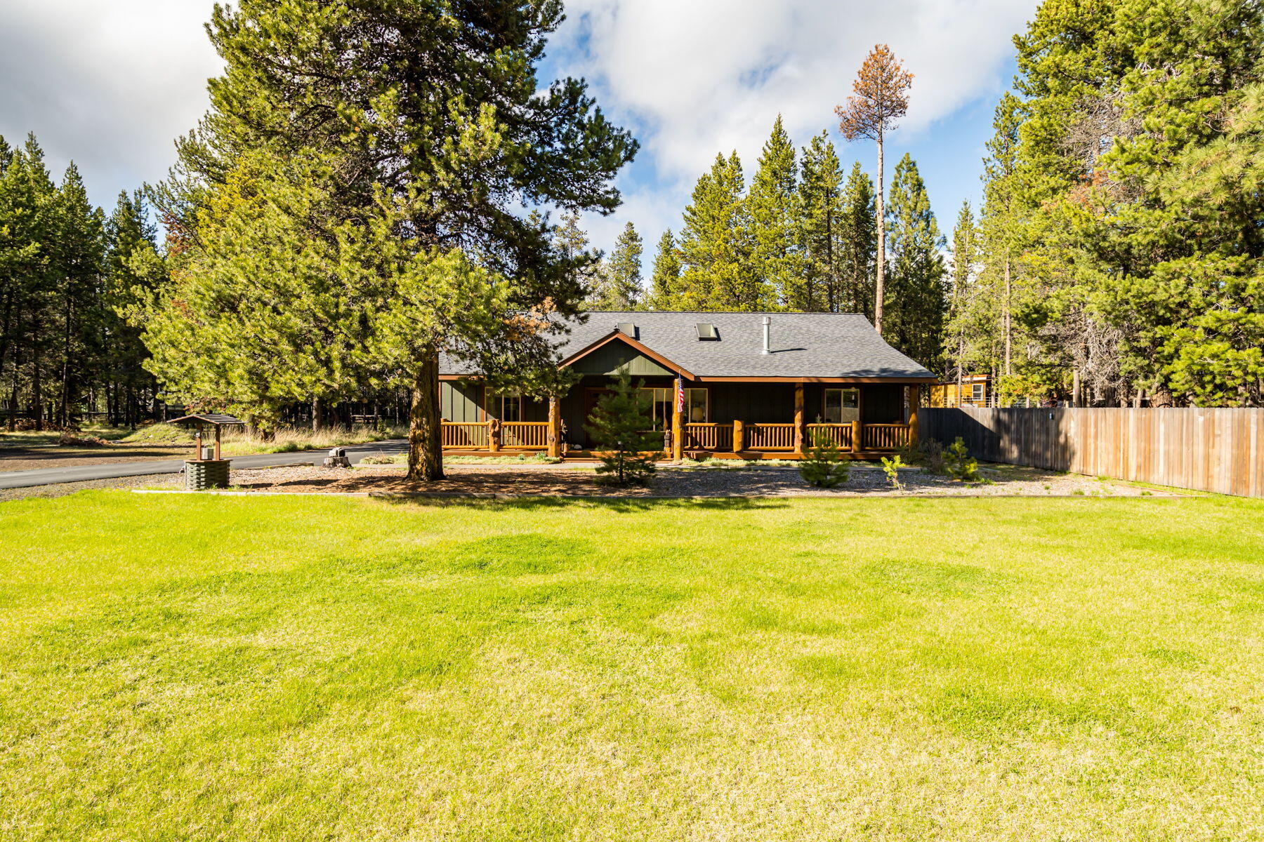 17048 Norwalk Road Bend, OR 97707 - Photo 1 of 36 a view of a swimming pool with an outdoor space and seating area