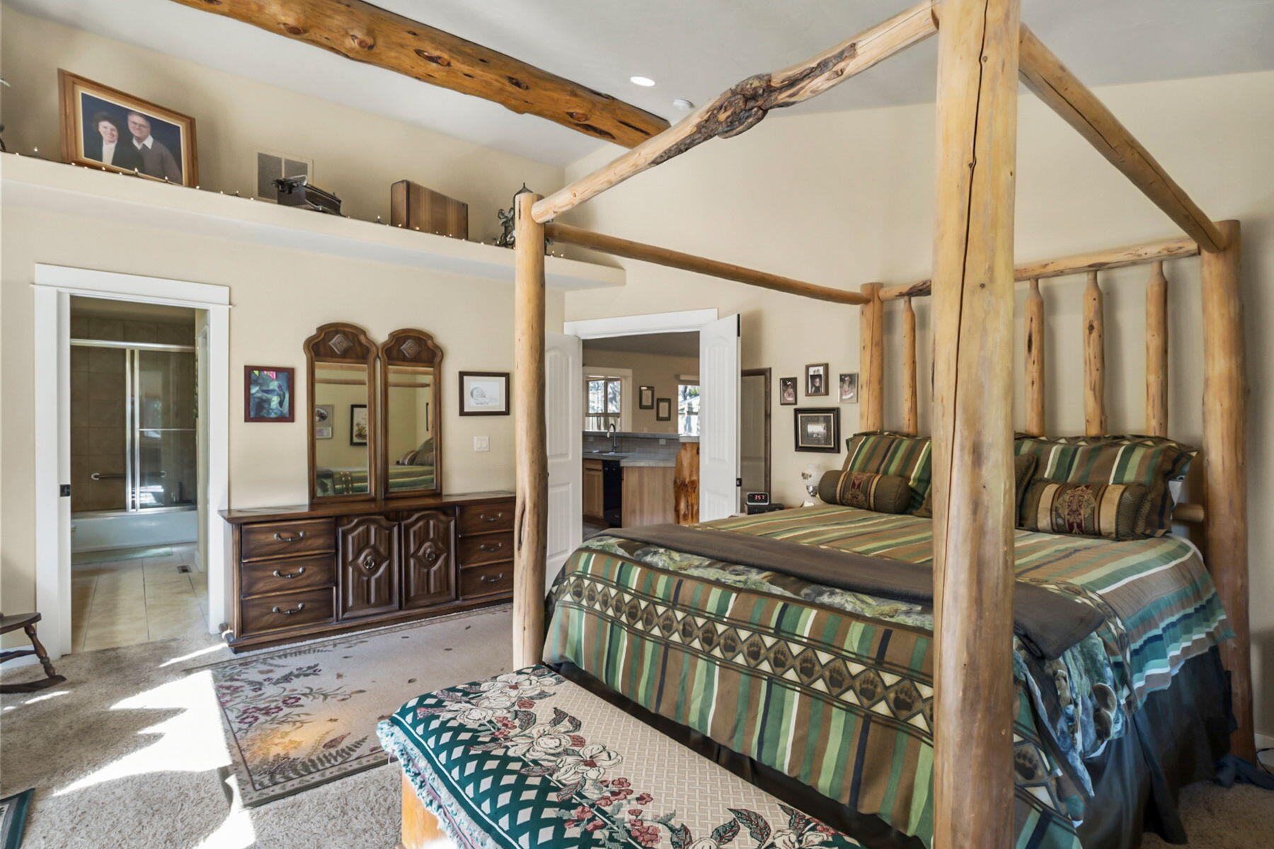 17048 Norwalk Road Bend, OR 97707 - Photo 14 of 36 a bedroom with a bed window and walk in closet