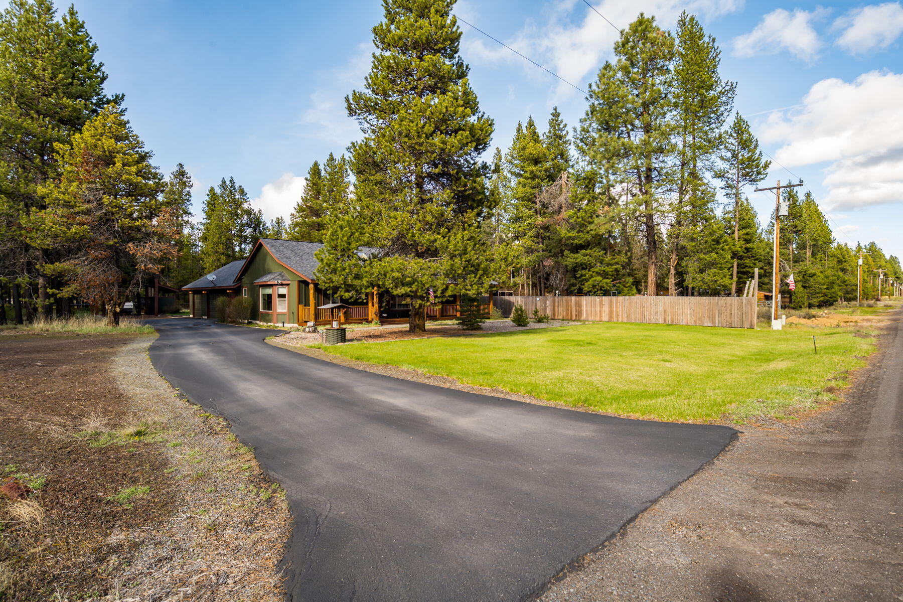 17048 Norwalk Road Bend, OR 97707 - Photo 29 of 36 a view of a house with basketball court