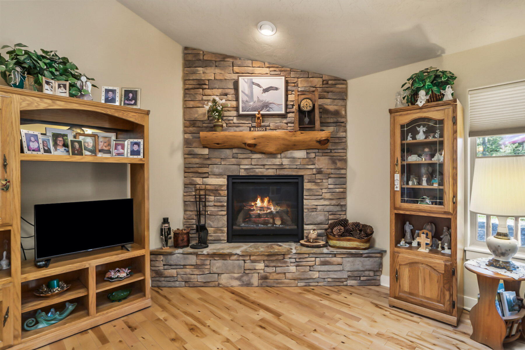 17048 Norwalk Road Bend, OR 97707 - Photo 5 of 36 a living room with furniture and a fireplace