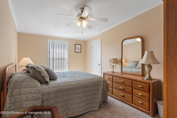 a bedroom with a bed and closet