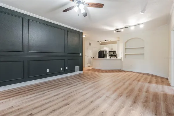 a view of a livingroom with a furniture
