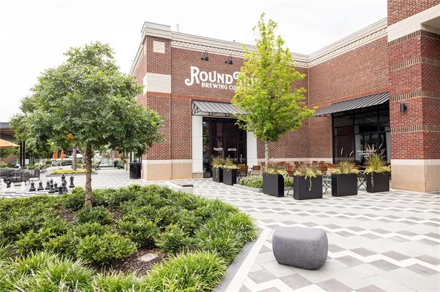 a front view of a building with an outdoor space