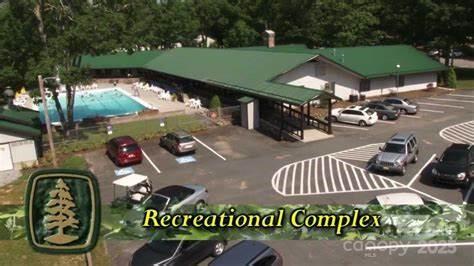 47 Hornbeam Road, Unit 234 Newland, NC 28657 - Photo 7 of 9 a front view of a house with garden