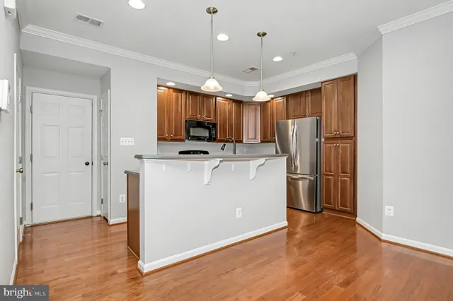 a bathroom with a sink and a window