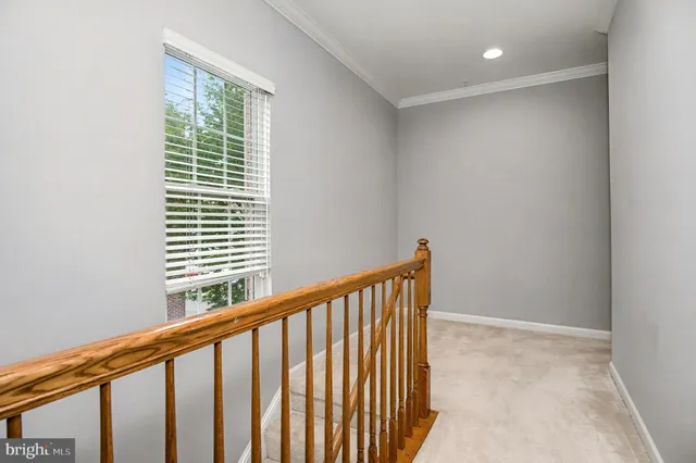 a bedroom with bed and window