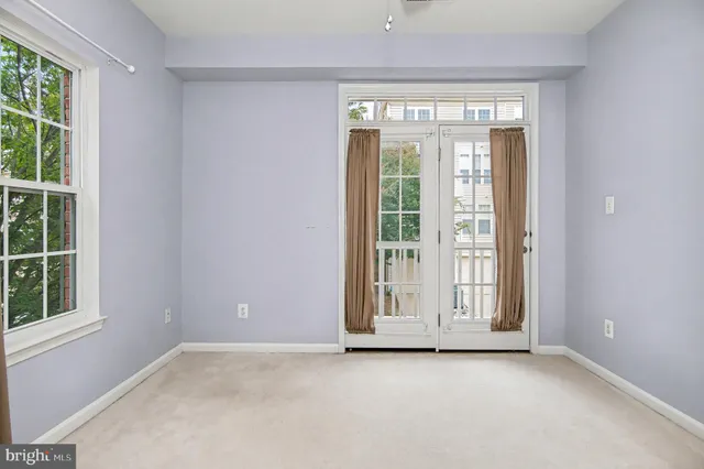 a view of a bathroom with a glass shower door