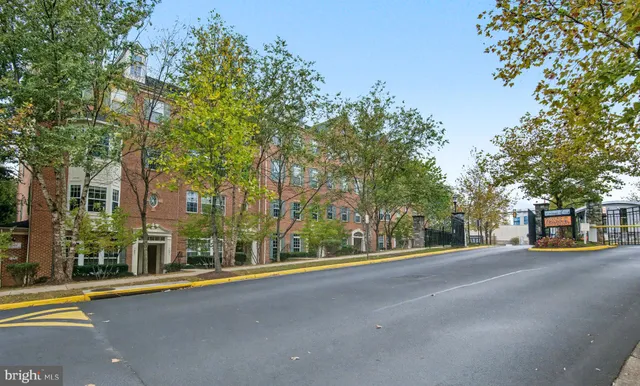 a living room with fireplace furniture and a flat screen tv