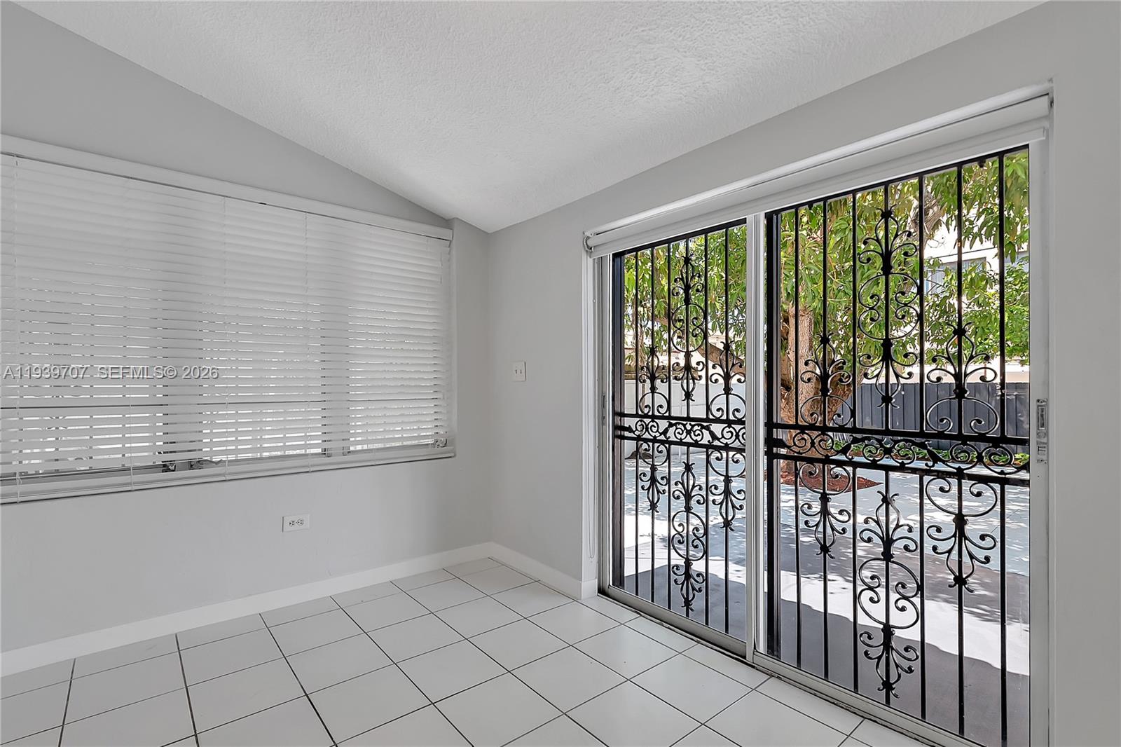 2327 Southwest 22nd Terrace, Unit FRONT Miami, FL 33145 - Photo 16 of 29 a view of a room that has a large window